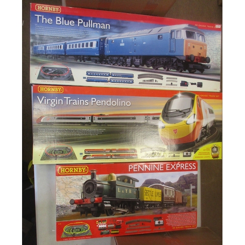 552 - Hornby. Range of OO gauge train sets, generally mint in near mint to mint boxes, with R1093 'The Blu... 