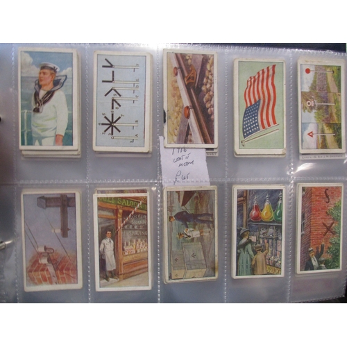 66 - Wills. Scissors collection in album with complete sets including Britains Defenders, Cinema Stars, D... 