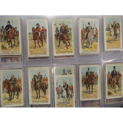 66 - Wills. Scissors collection in album with complete sets including Britains Defenders, Cinema Stars, D... 