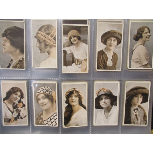 67 - Wills. Scissors. Collection in album with complete sets including, Actresses (mauve, orange, red), B... 