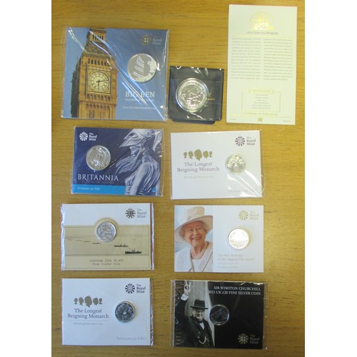 579 - Silver uncirculated range on Royal Mint cards with £20 2014 WWI, 2015 Churchill, Longest Reign (2), ... 