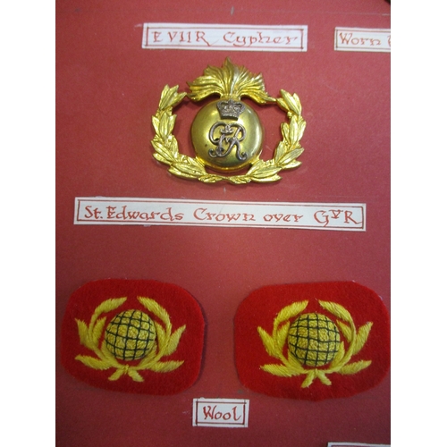 130 - Royal Marine Bands Portsmouth Division helmet plate and cap badge collection mounted on board includ... 