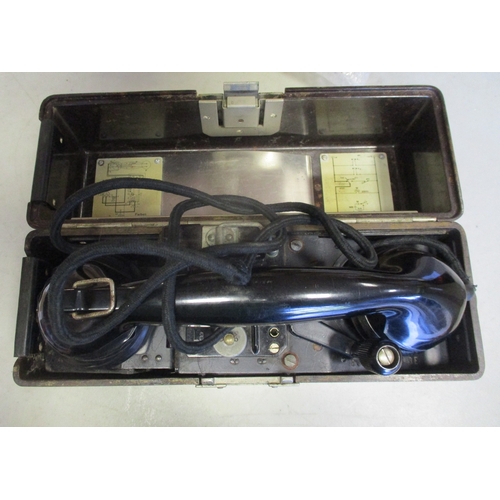 185 - 1943 German Field Telephone No 84038 in fitted bakelite carrying case with hinged lid, measures 27cm... 