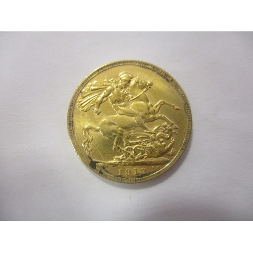 486 - Investment Gold lot - documents required. 1912 sovereign near very fine. (Y)