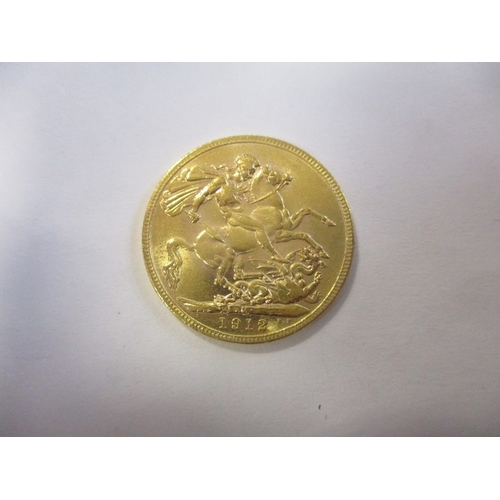 487 - Investment Gold lot - documents required. 1912M sovereign very fine. (Y)