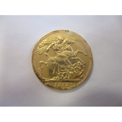 490 - Investment Gold lot - documents required. 1912 sovereign fine. (Y)