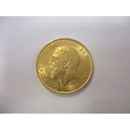 508 - Investment Gold lot - documents required. 1915 sovereign near very fine. (Y)