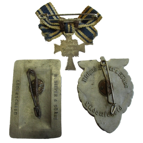 82 - Third Reich range with:
1. Miniature Cross of Honour of the German Mother (2nd Type) in silver mount... 