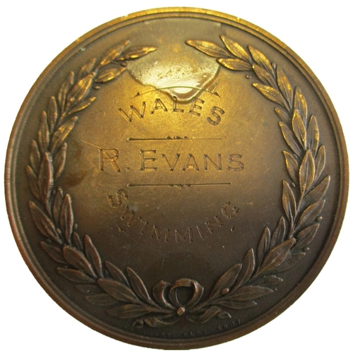 827 - Welsh swimming interest range with:
1. 1934 British Empire Games 46mm bronze participant's medal, re... 