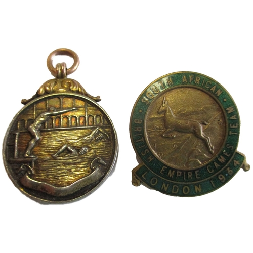 827 - Welsh swimming interest range with:
1. 1934 British Empire Games 46mm bronze participant's medal, re... 