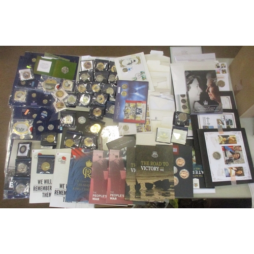 888 - Modern accumulation of GB and world commemorative coins, booklets, coin covers and medallic issues, ... 