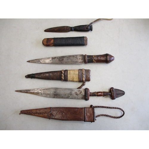 99 - Native edged weapons range with:
1. Indian Katar punch dagger, tip is broken.
2. African/Middle East... 