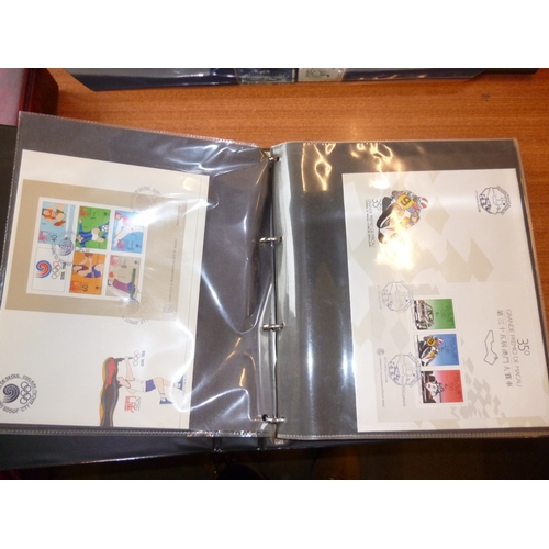 205 - Macao. 1988 to 2005 coln FDCs (sets and mini sheets) in 4 albums. Large selection.  (B)