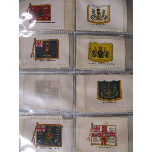 48 - Phillips. Collection in 2 albums of silks including Birds, British Naval Crests, Flags, Regimental C... 