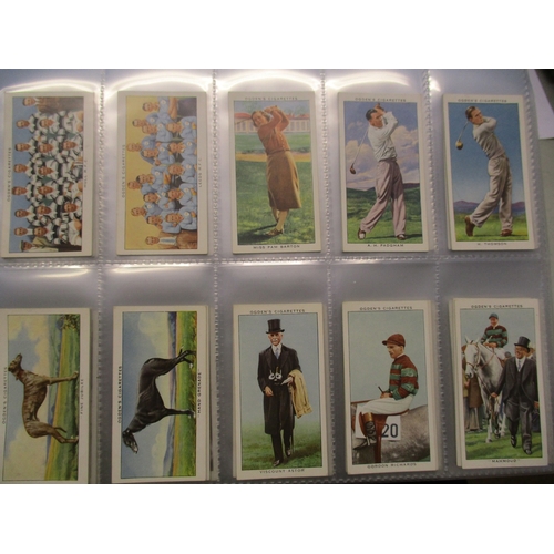 12 - Collection in 21 albums with complete sets including Churchman Association Footballers, Boxing Perso... 