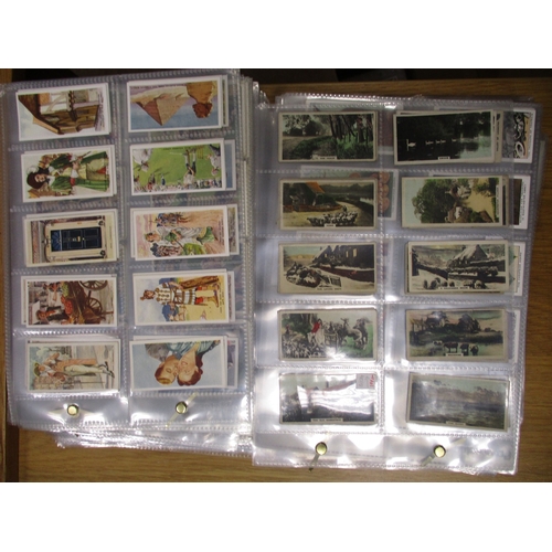 33 - Collection in plastic sleeves with complete sets including Mitchell Clan Tartans, Famous Scots, Rive... 