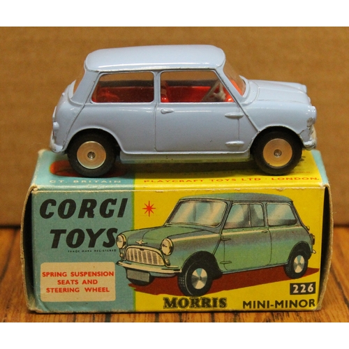 396 - Corgi. Morris Mini-Minor No. 226, pale blue body, red interior, flat hubs, good plus in good plus bo... 