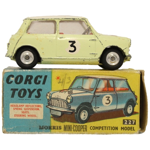 398 - Corgi. Mini Cooper Rally No. 227, primrose yellow body, white roof and bonnet with flags, red interi... 