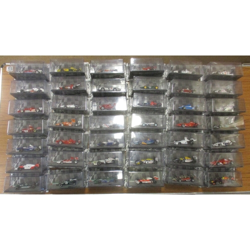 453 - Panini. Range of 'Formula 1: The Car Collection' die cast racing cars (72), generally mint in magazi... 