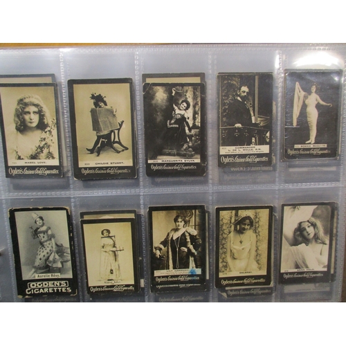 47 - Ogdens. Collection in album with Guinea Golds and Tab types including Actresses, Famous Authors and ... 