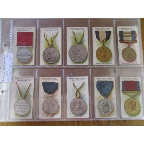 50 - Taddy. Complete set in plastic sleeves British Medals (black) generally good. Cat. £750. (See photo)... 