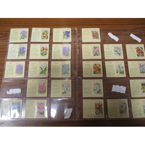 58 - Wix. Collection in plastic sleeves with Kensitas flowers standard size plain (90), printed (280), la... 