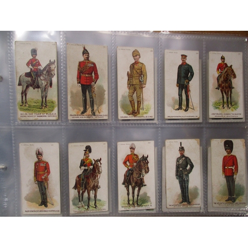 6 - Collection in albums including ranges from Gallaher Regimental Colours (28), The South African Serie... 