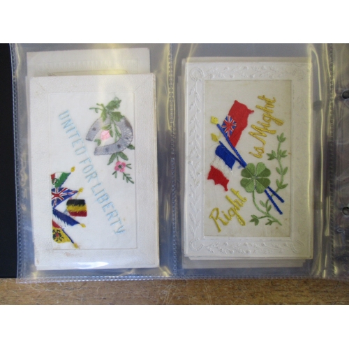 81 - Misc. coln. in small modern album. Embroidered silks (19) incl. RFA, greetings and patriotic. Greeti... 