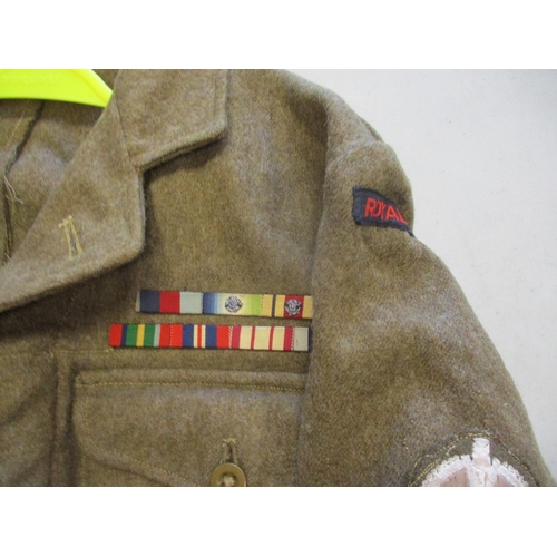 154 - Uniform range with:
1. Royal Marine Artillery circa 1920 blue tunic, KC RMA buttons, small hole to l... 