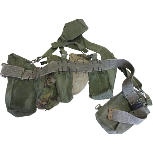 179 - 1958 Pattern webbing range including large pack, poncho and roll, webbing, yoke, 2 belts, 7 pouches ... 