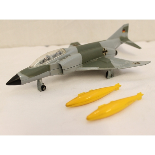 242 - Dinky. German F-4K 'Phantom II' Der Bundelsluftwaffe No. 733, grey/ green camouflage body, yellow mi... 