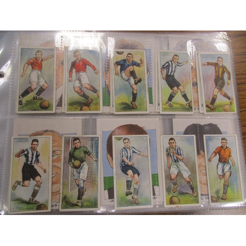 1 - Collection in albums, stock books and in sleeves including BAT Guernsey Footballers set, Chix Footba... 