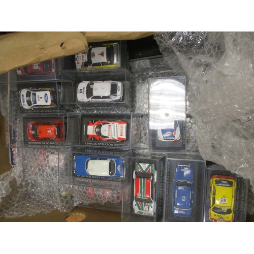 168 - Collection including Anso, Atlas, Corgi, Onyx, Oxford Die Cast, racing cars in plastic display cases... 