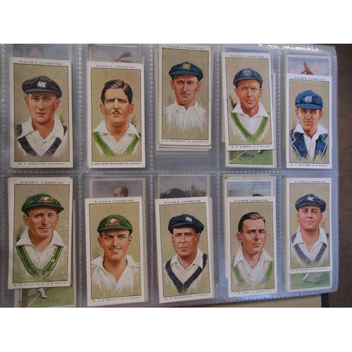 18 - Collection in albums and loose with complete sets including Players Cricketers 1934, Game Birds & Wi... 