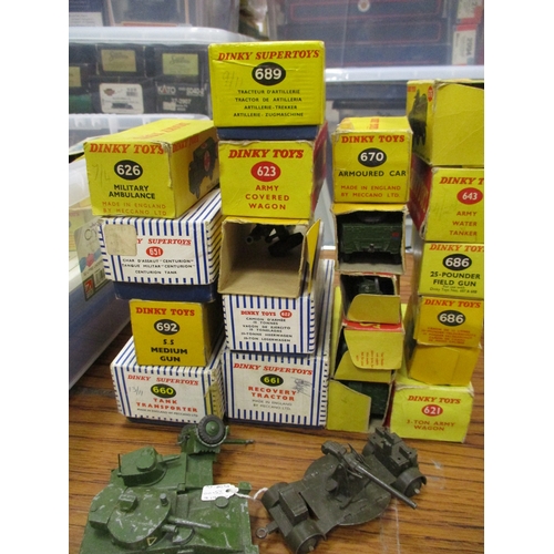 234 - Dinky. Collection of military vehicles including Ambulance No 626, Artillery Tractor No 689, Covered... 