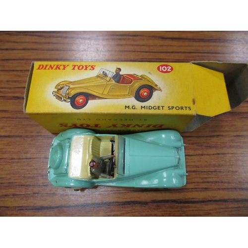 239 - Dinky. M.G. Midget Sports, lime green No 102, generally excellent in excellent box. (See photo) (T)