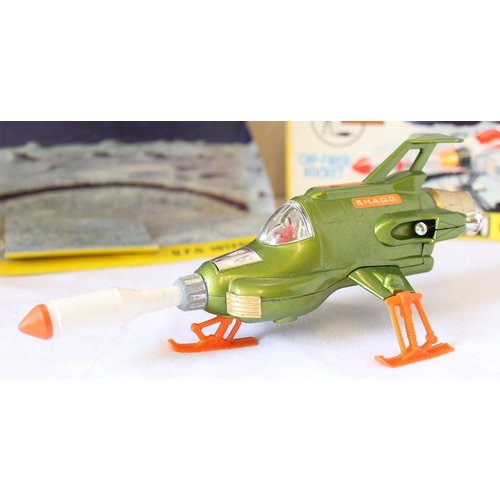 240 - Dinky. 351 UFO Shado Interceptor with green body, chrome interior with clear canopy, orange legs and... 