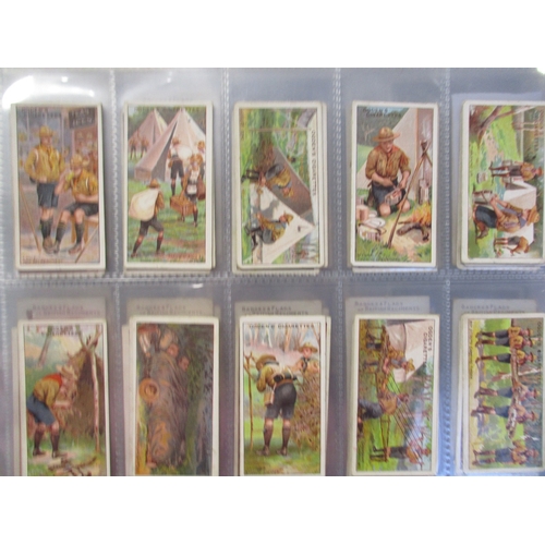 26 - Collection in album with complete sets including Ardath Famous Footballers, Ogdens Boy Scouts, Derby... 