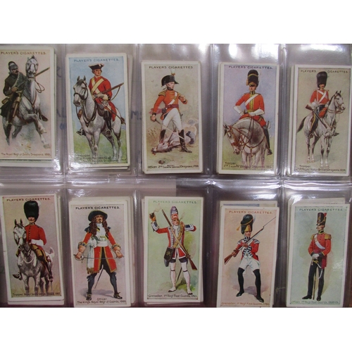 29 - Collection in album with complete sets including Ogdens Infantry Training, Players Regimental Unifor... 