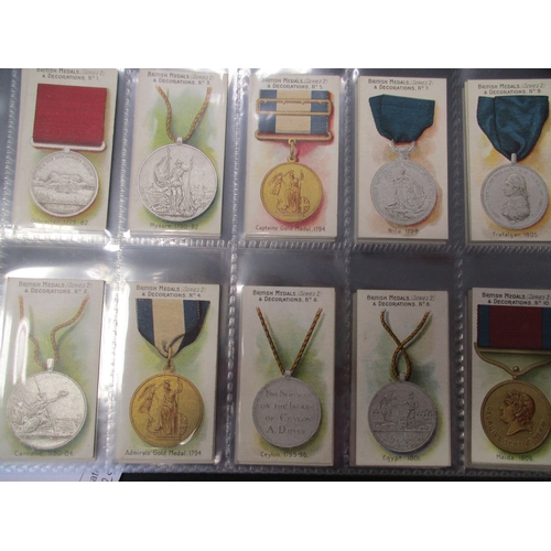 59 - Taddy. Complete set in plastic sleeves with 1912 British Medals & Decorations generally very good. C... 