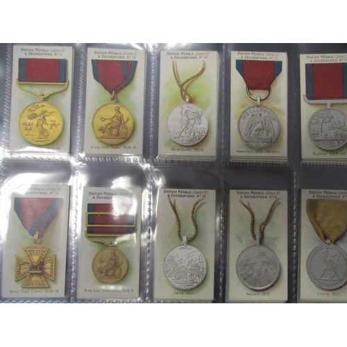 59 - Taddy. Complete set in plastic sleeves with 1912 British Medals & Decorations generally very good. C... 