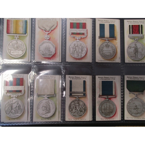 59 - Taddy. Complete set in plastic sleeves with 1912 British Medals & Decorations generally very good. C... 