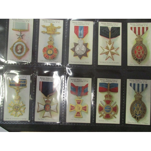 59 - Taddy. Complete set in plastic sleeves with 1912 British Medals & Decorations generally very good. C... 