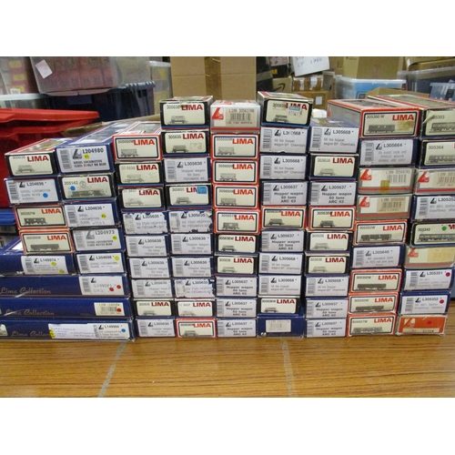 594 - Lima. Collection of boxed OO gauge including locomotives (7), sets (4), coaches (15) and wagons (75)... 