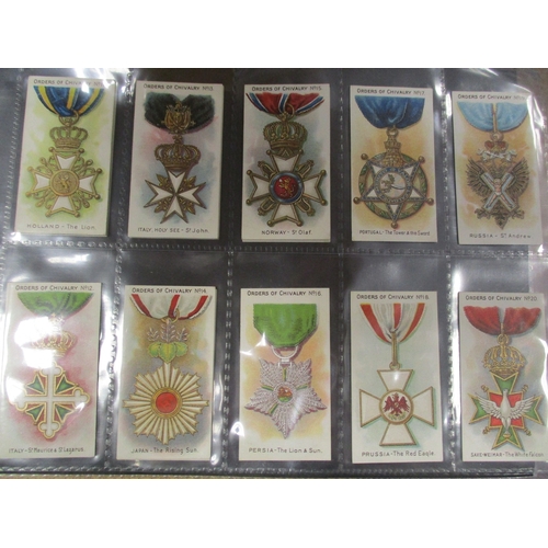 65 - Taddy. Complete set in plastic sleeves with 1911 Orders of Chivalry generally very good. Cat. £600. ... 