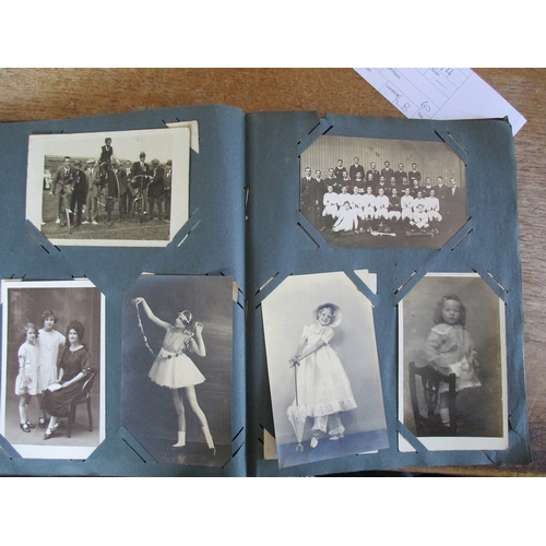 96 - Misc. coln. in old album and loose. General views, greetings, children, family portraits incl. milit... 