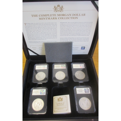 1059 - USA. 'The Complete Morgan Dollar Mintmark Collection' cased set of 5, generally fine to very fine, w... 