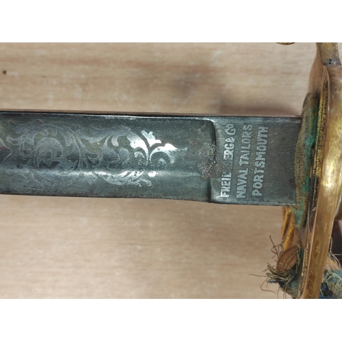 118 - KGV post 1900 Royal Navy warrant officers sword, fullered blade 60% ornately etched on both sides wi... 