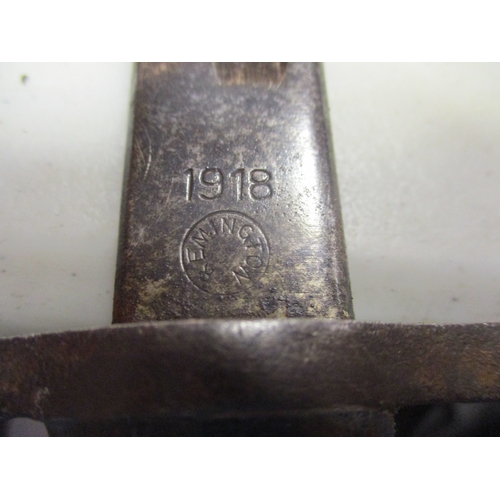 131 - 1918 error dated 1917 Pattern Remington bayonet and scabbard, ricasso marked 1918 over Remington in ... 