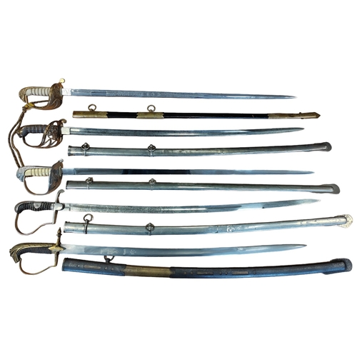 145 - Range of replica swords with mix of metal and leather scabbards includes Iraq naval officers sword w... 